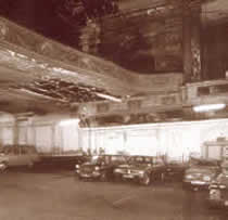 Photograph of an old cinema being used as a car showroom
