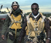A still from the film Red Tails of four black pilots wearing goggles and safety equipment
