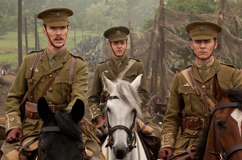 A shot of three army officers in World War One uniforms on horse back looking directly towards the camera.