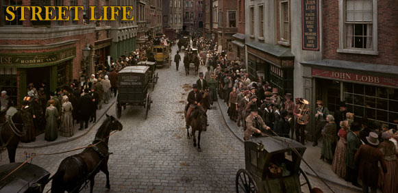 Streetlife graphic - image of busy street, with horses and carriages, public houses, crowds of people