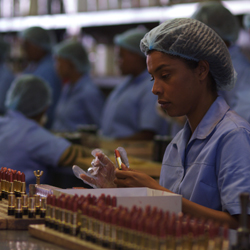 Sandra working in the lipstick factory