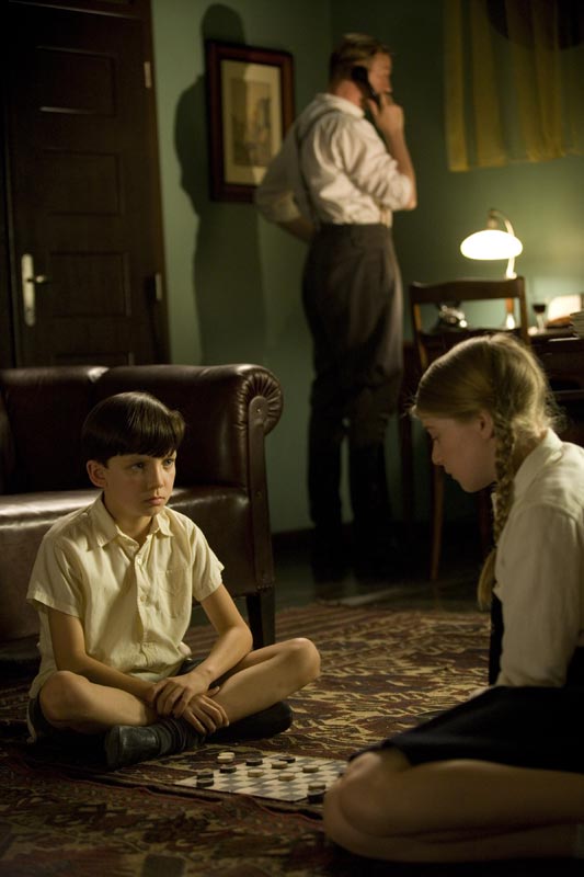 Still image from The Boy in the Striped Pyjamas - Bruno and Gretel playing chess